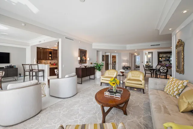 a living room with fireplace furniture and a flat screen tv