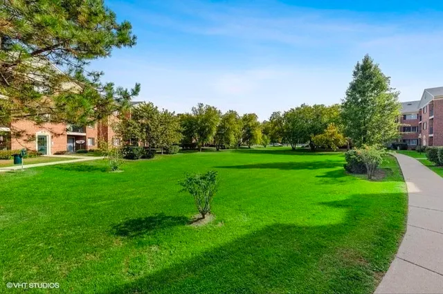 a view of a house with a big yard