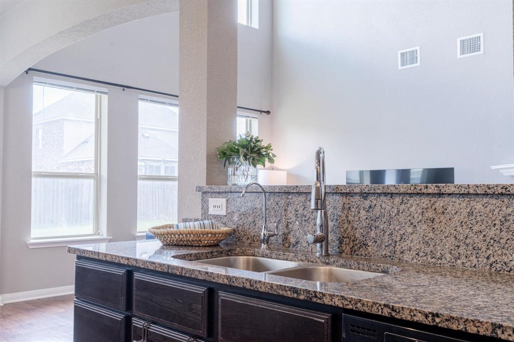 2716 Beutel Road Lorena, TX 76655 - Photo 9 of 39 a kitchen with sink and window