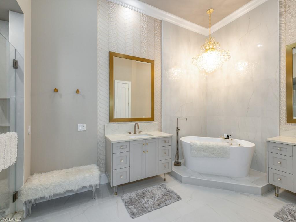 28560 Calabria Court, Unit 202 Naples, FL 34110 - Photo 16 of 50 Primary Bathroom