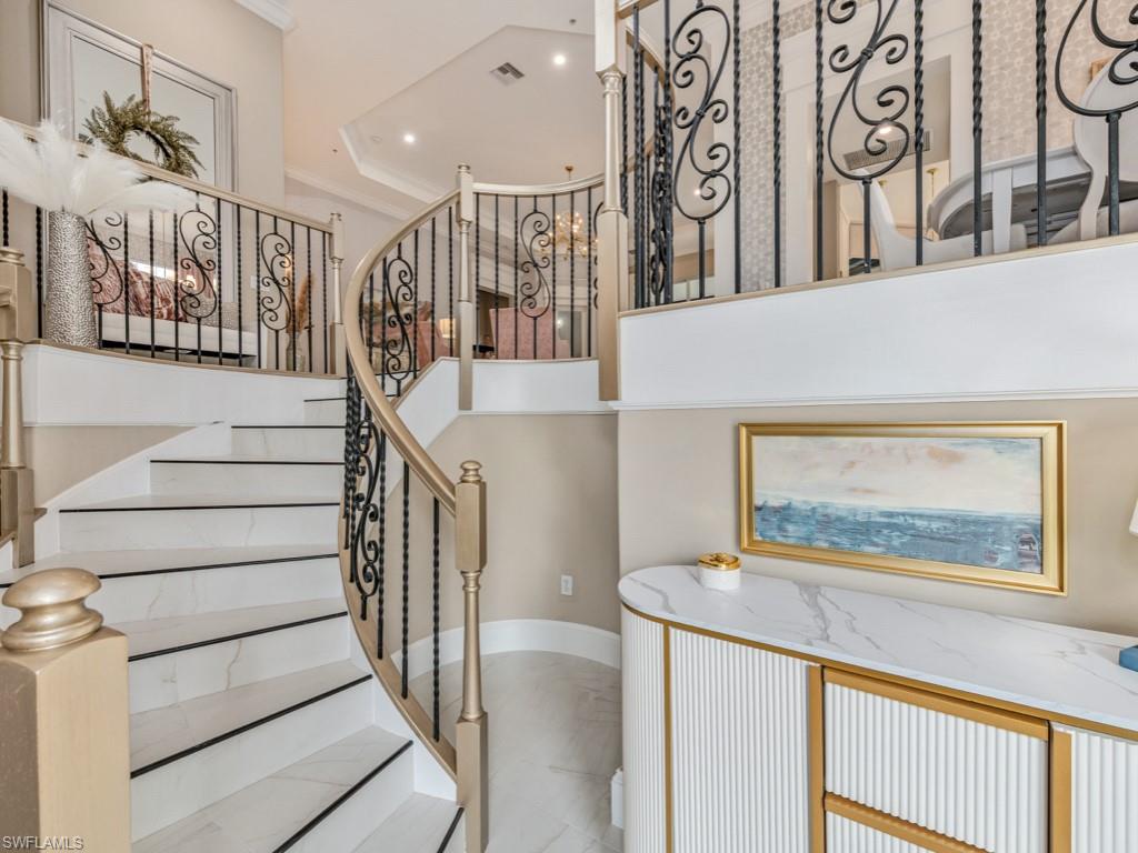 28560 Calabria Court, Unit 202 Naples, FL 34110 - Photo 2 of 50 Foyer entry stairway