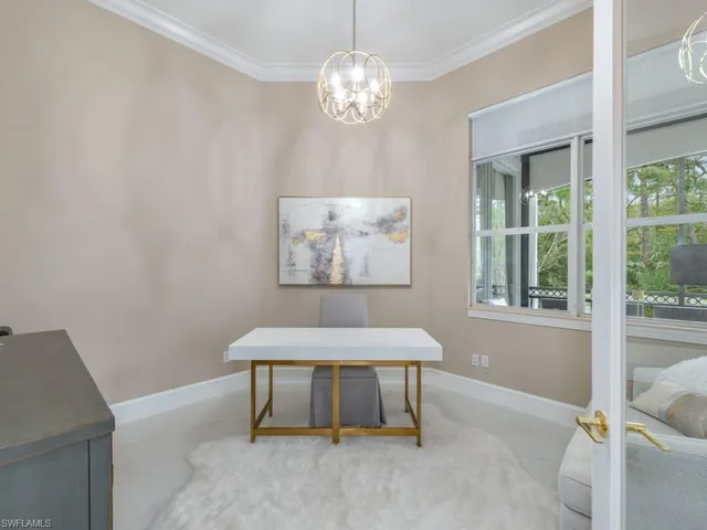 a room with a table and a window