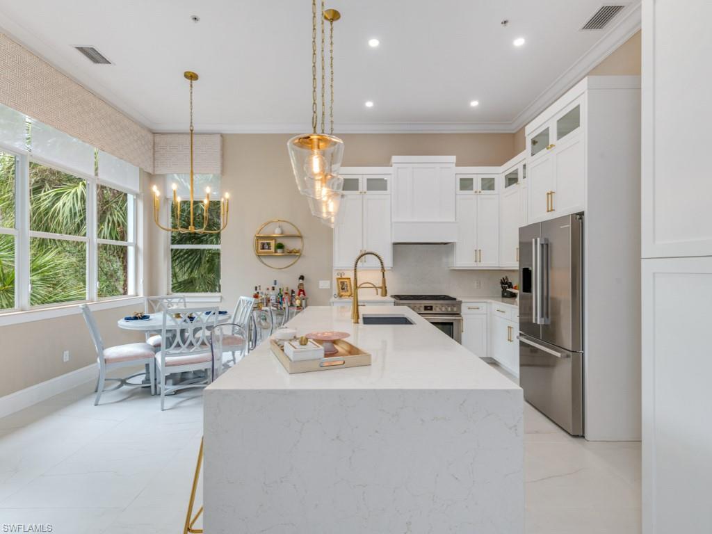 28560 Calabria Court, Unit 202 Naples, FL 34110 - Photo 9 of 50 Kitchen