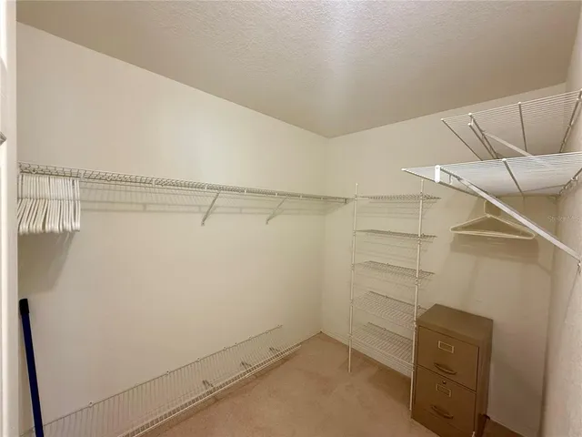 a view of a room with racks on the wall