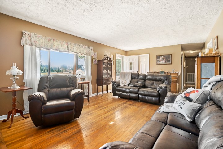 502 Rock Road Morrison, TN 37357 - Photo 22 of 44 a living room with furniture and a large window