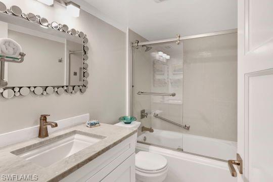 265 Yorkshire Court, Unit 8 Naples, FL 34112 - Photo 11 of 33 Bathroom with vanity and enclosed tub / shower combo
