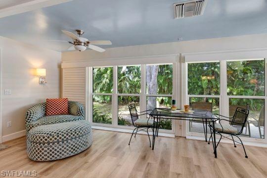 265 Yorkshire Court, Unit 8 Naples, FL 34112 - Photo 13 of 33 View of sunroom / solarium