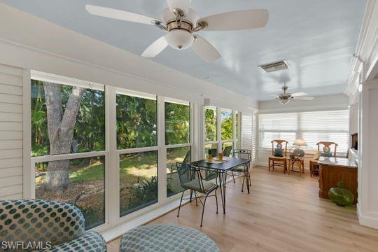 265 Yorkshire Court, Unit 8 Naples, FL 34112 - Photo 14 of 33 Sunroom with wood finished floors
