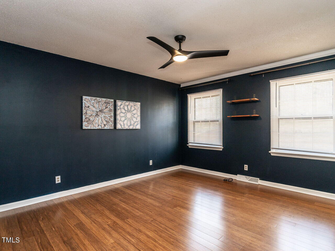 306 Southeast Maynard Road Cary, NC 27511 - Photo 16 of 33 016-1280x960-primary-bedroom
