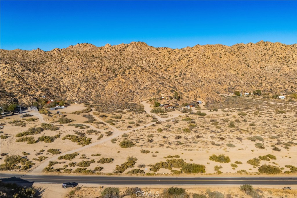 6350 Pioneertown Road Pioneertown, CA 92268 - Photo 13 of 36 a view of a building with a snow on the road