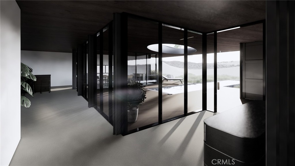 6350 Pioneertown Road Pioneertown, CA 92268 - Photo 33 of 36 a lobby with furniture and floor to ceiling window