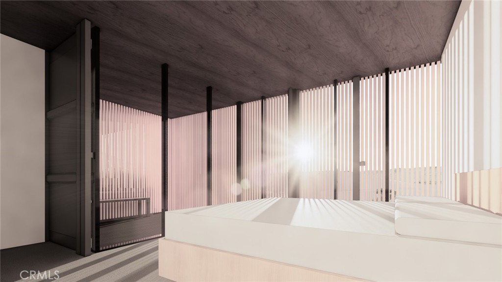 6350 Pioneertown Road Pioneertown, CA 92268 - Photo 36 of 36 a bed sitting in a spacious bedroom next to a window