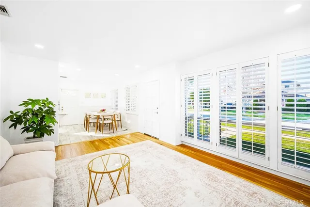 a view of a swimming pool with a lounge chair