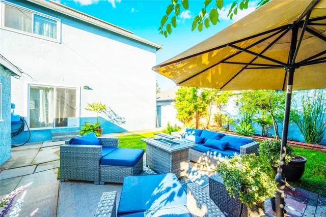 an aerial view of a house with a garden