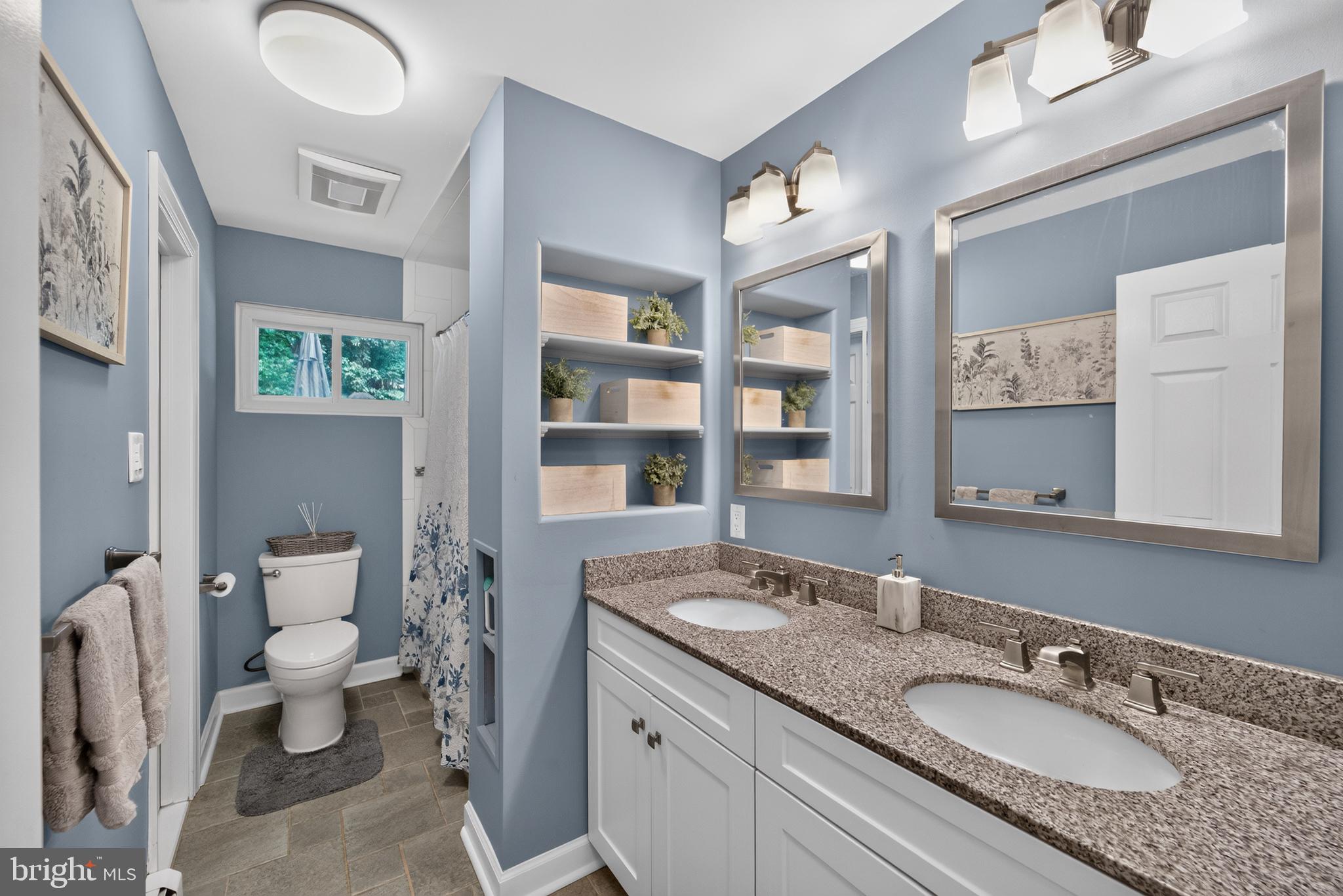 338 Woolf Road Milford, NJ 08848 - Photo 14 of 24 Serene blue-hued bathroom retreat.