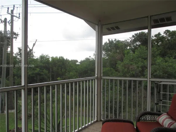 a view of a lake from a balcony