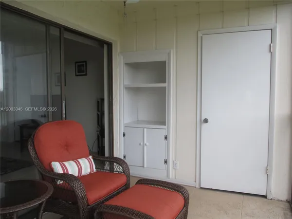 a view of a chair in a balcony