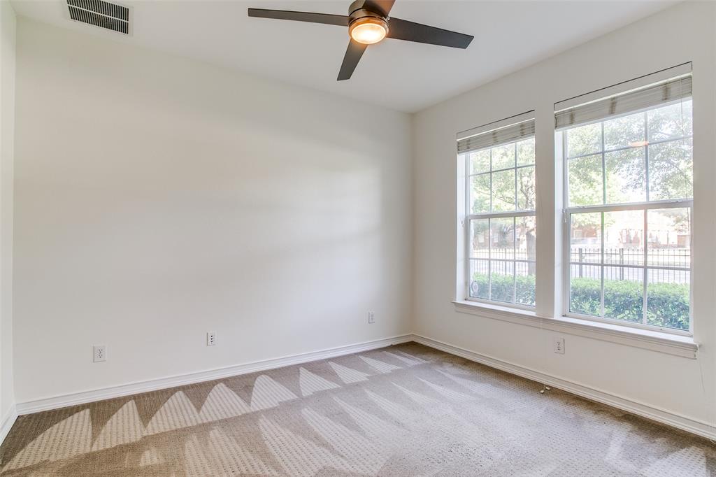 1600 Abrams Road, Unit 8 Dallas, TX 75214 - Photo 17 of 26 a view of an empty room and window ceiling fan