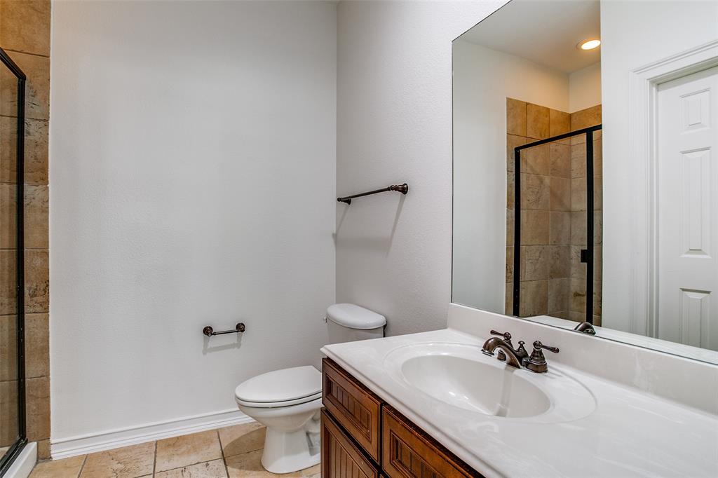 1600 Abrams Road, Unit 8 Dallas, TX 75214 - Photo 19 of 26 a bathroom with a sink toilet and mirror