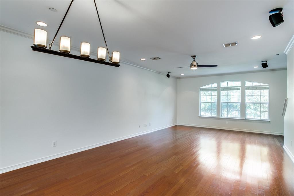1600 Abrams Road, Unit 8 Dallas, TX 75214 - Photo 6 of 26 wooden floor in an empty room with a window