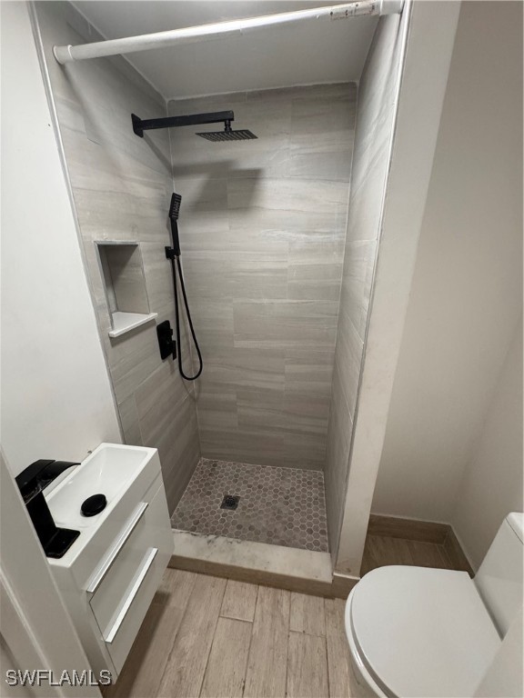 15344 Wall Drive Fort Myers, FL 33908 - Photo 11 of 21 a bathroom with a sink toilet and shower