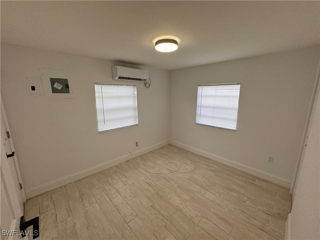 15344 Wall Drive Fort Myers, FL 33908 - Photo 7 of 21 a view of an empty room with a window