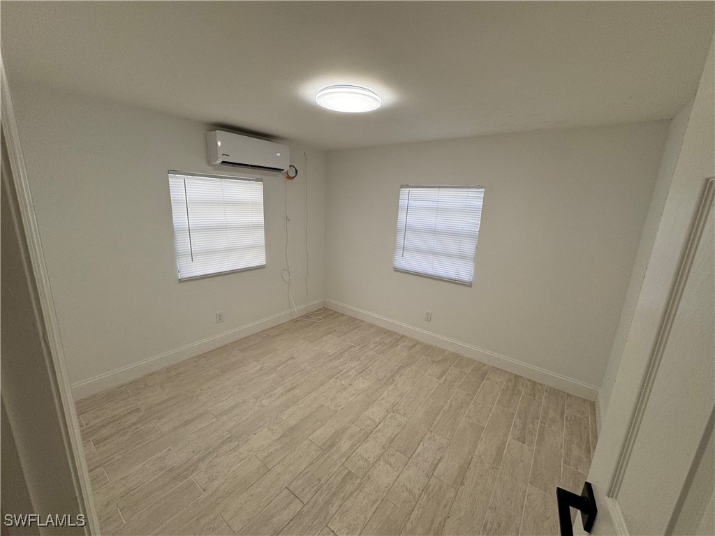 15344 Wall Drive Fort Myers, FL 33908 - Photo 9 of 21 an empty room with a window