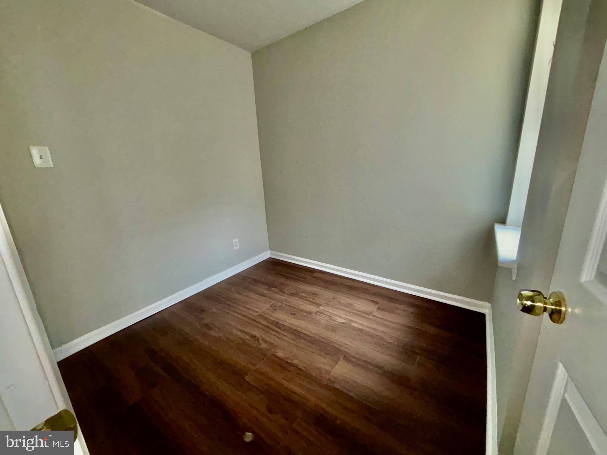 5258 Hazel Avenue Philadelphia, PA 19143 - Photo 13 of 22 a view of a room with wooden floor