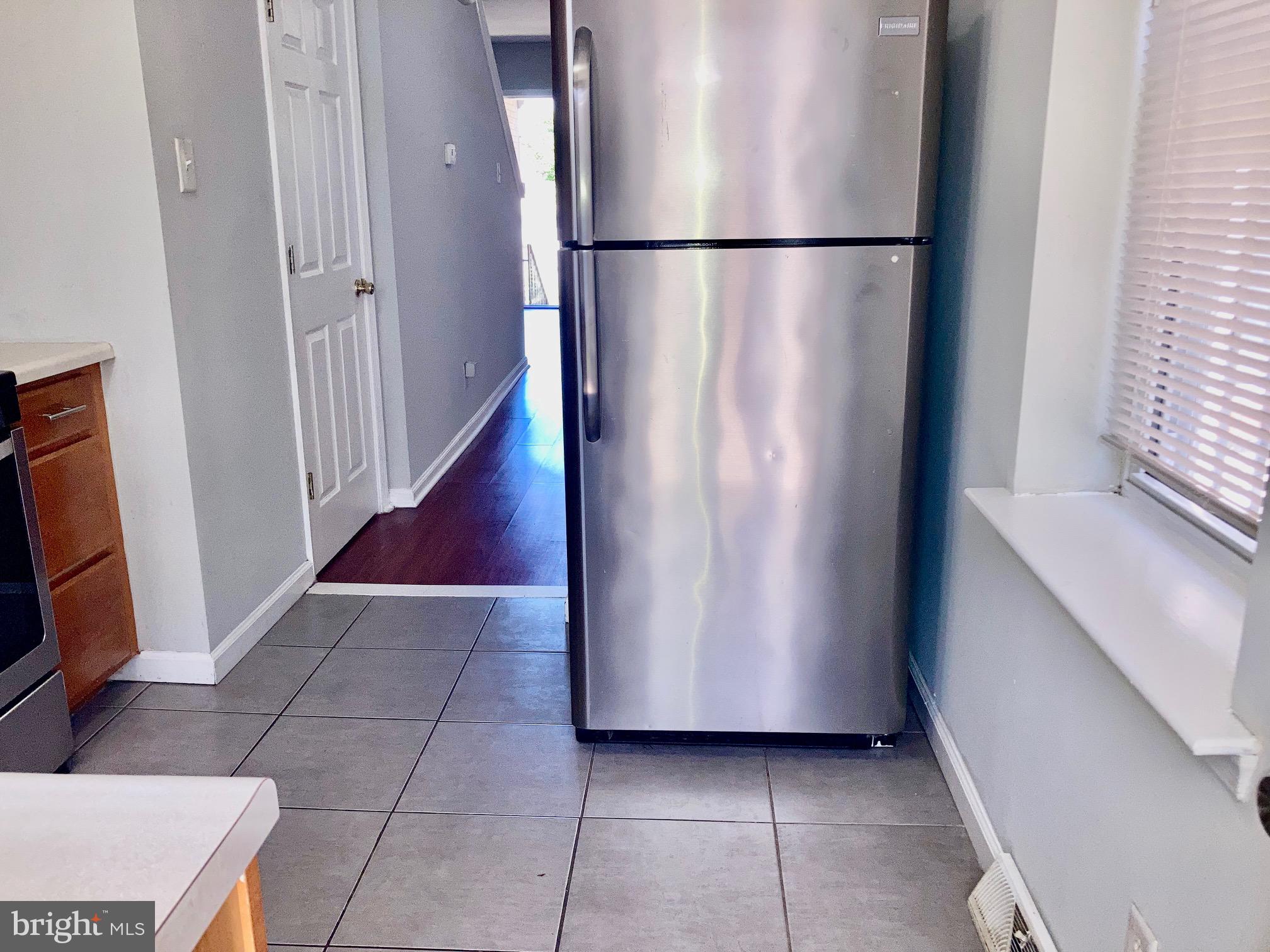 5258 Hazel Avenue Philadelphia, PA 19143 - Photo 5 of 22 a view of a room with racks on the wall