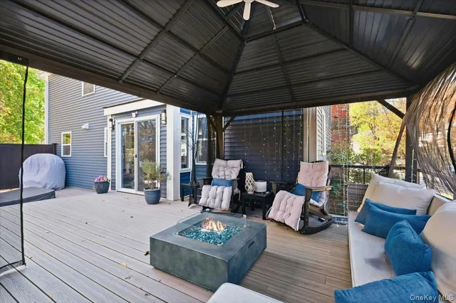 a outdoor living space with furniture and garden view
