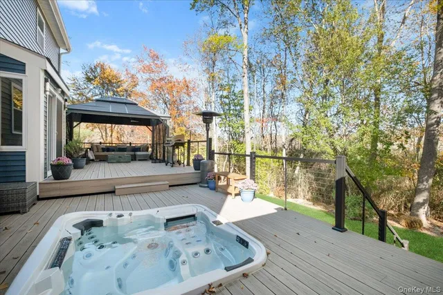 a view of deck with couch and chairs