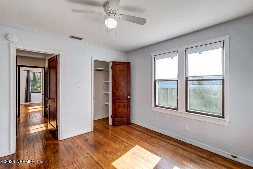 60 Weeden Street St. Augustine, FL 32084 - Photo 17 of 46 wooden floor in an empty room with a window