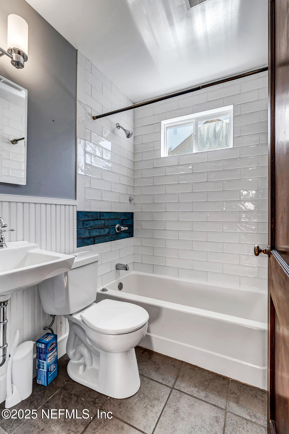 60 Weeden Street St. Augustine, FL 32084 - Photo 21 of 46 a bathroom with a toilet a sink and bathtub