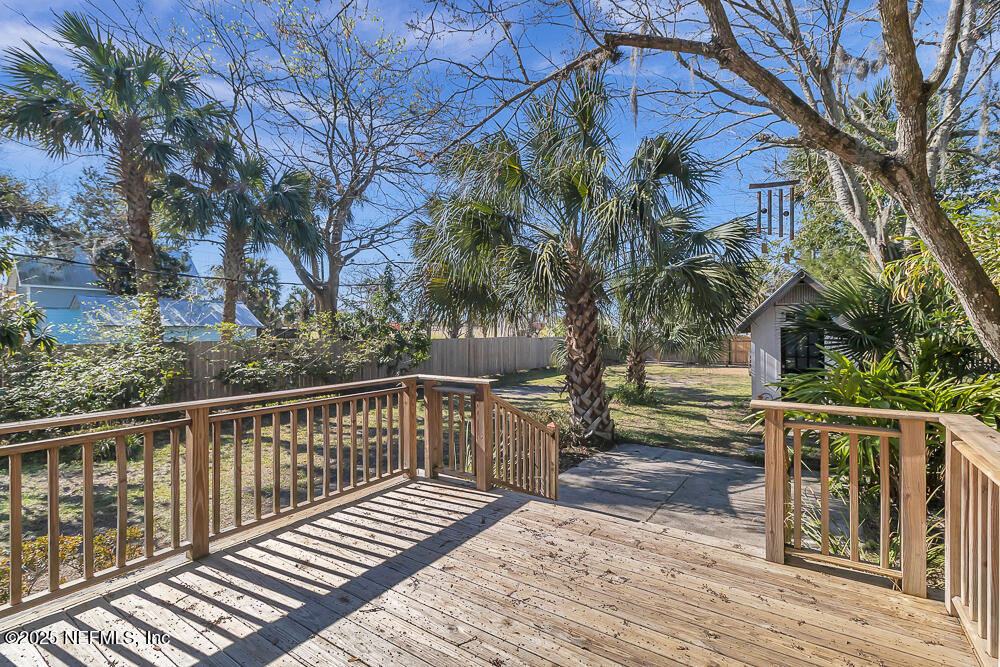 60 Weeden Street St. Augustine, FL 32084 - Photo 23 of 46 a view of balcony with wooden floor and fence