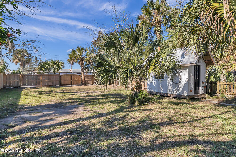 60 Weeden Street St. Augustine, FL 32084 - Photo 26 of 46 a view of a house with a yard
