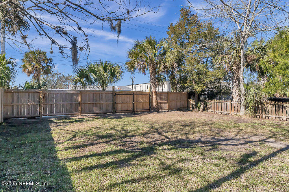 60 Weeden Street St. Augustine, FL 32084 - Photo 27 of 46 a view of a backyard with tree s