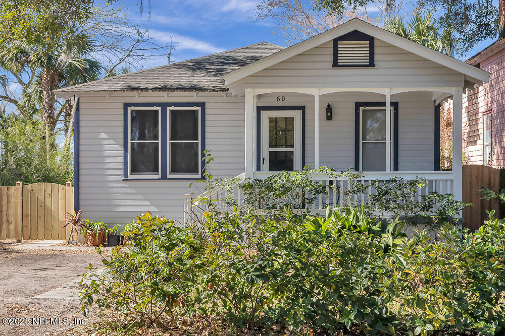 60 Weeden Street St. Augustine, FL 32084 - Photo 32 of 46 a front view of a house with a yard