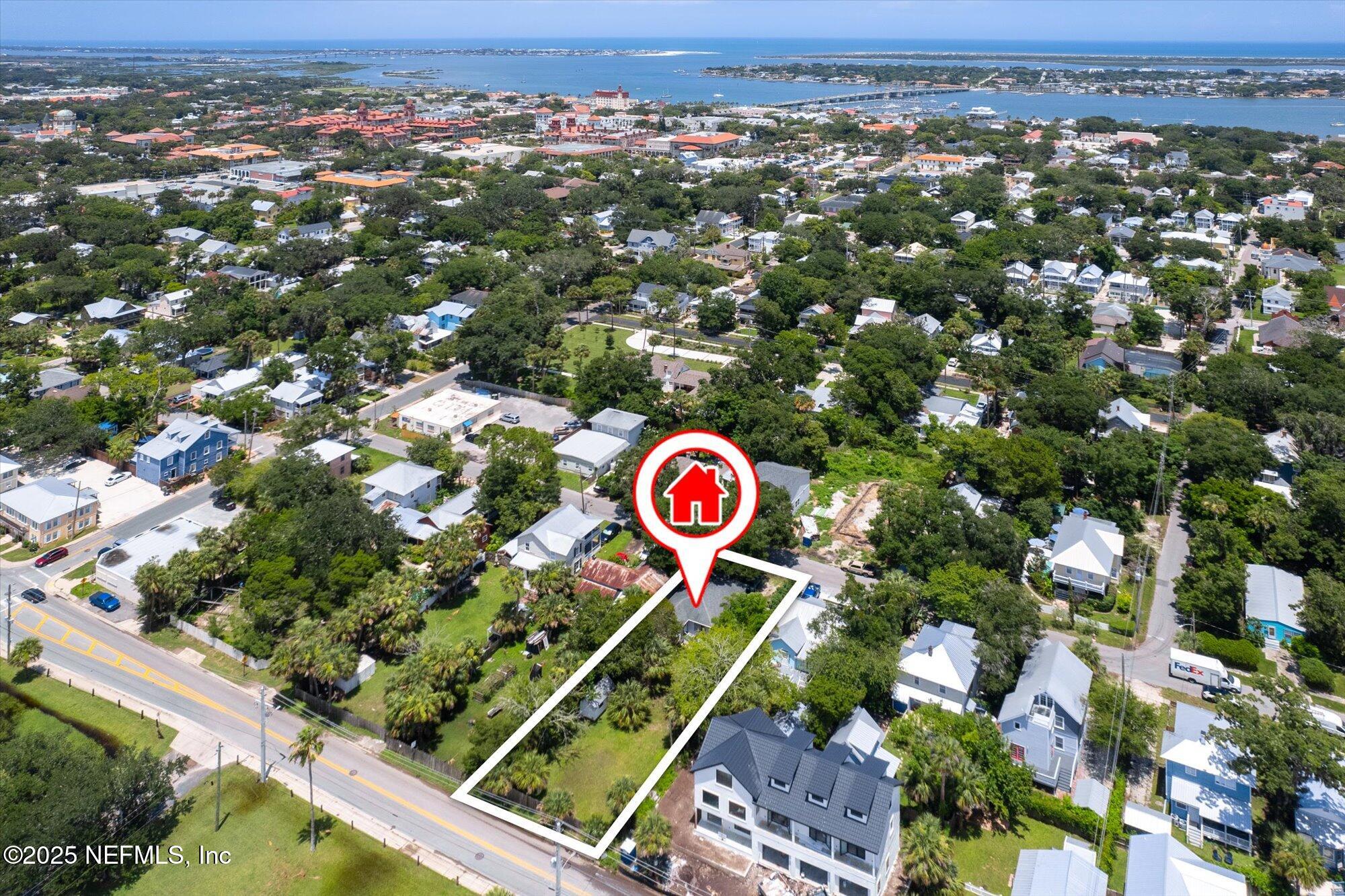 60 Weeden Street St. Augustine, FL 32084 - Photo 41 of 46 an aerial view of residential house with outdoor space and parking space