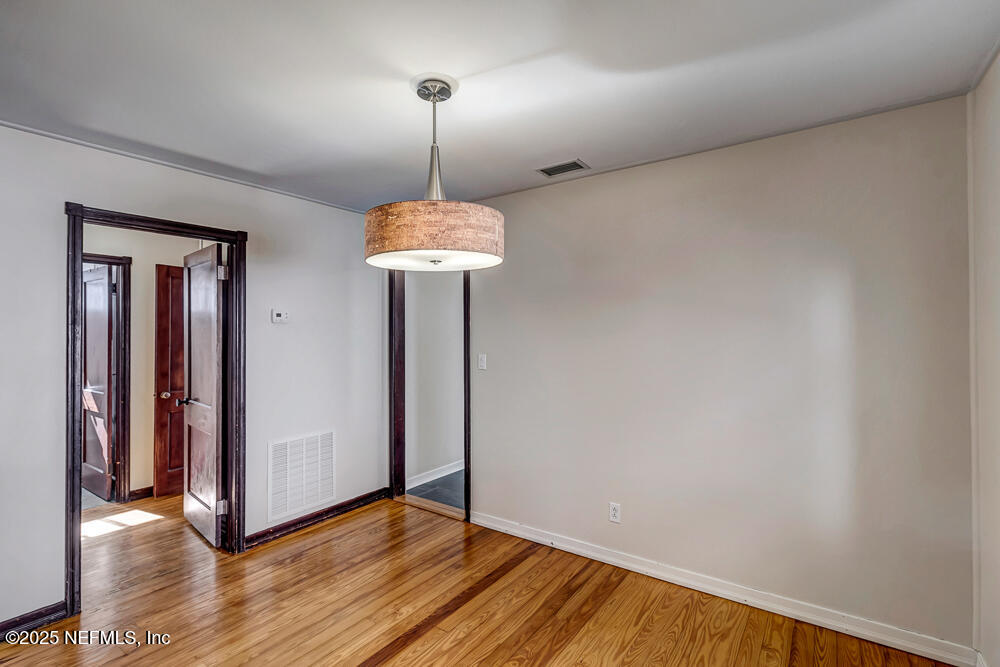 60 Weeden Street St. Augustine, FL 32084 - Photo 8 of 46 a view of hallway with a chandelier