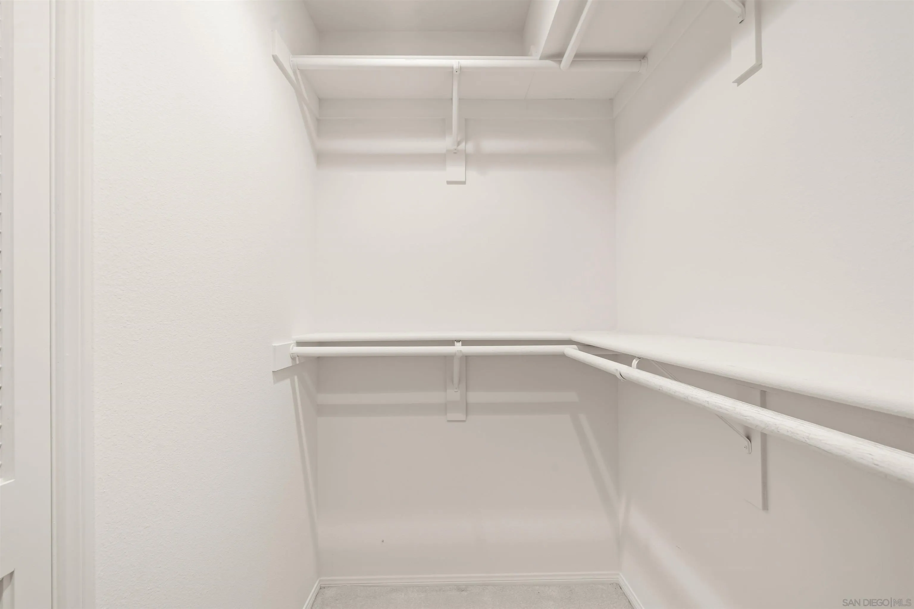 13286 Ocean Vista Road San Diego, CA 92130 - Photo 53 of 66 a view of an empty walk in closet