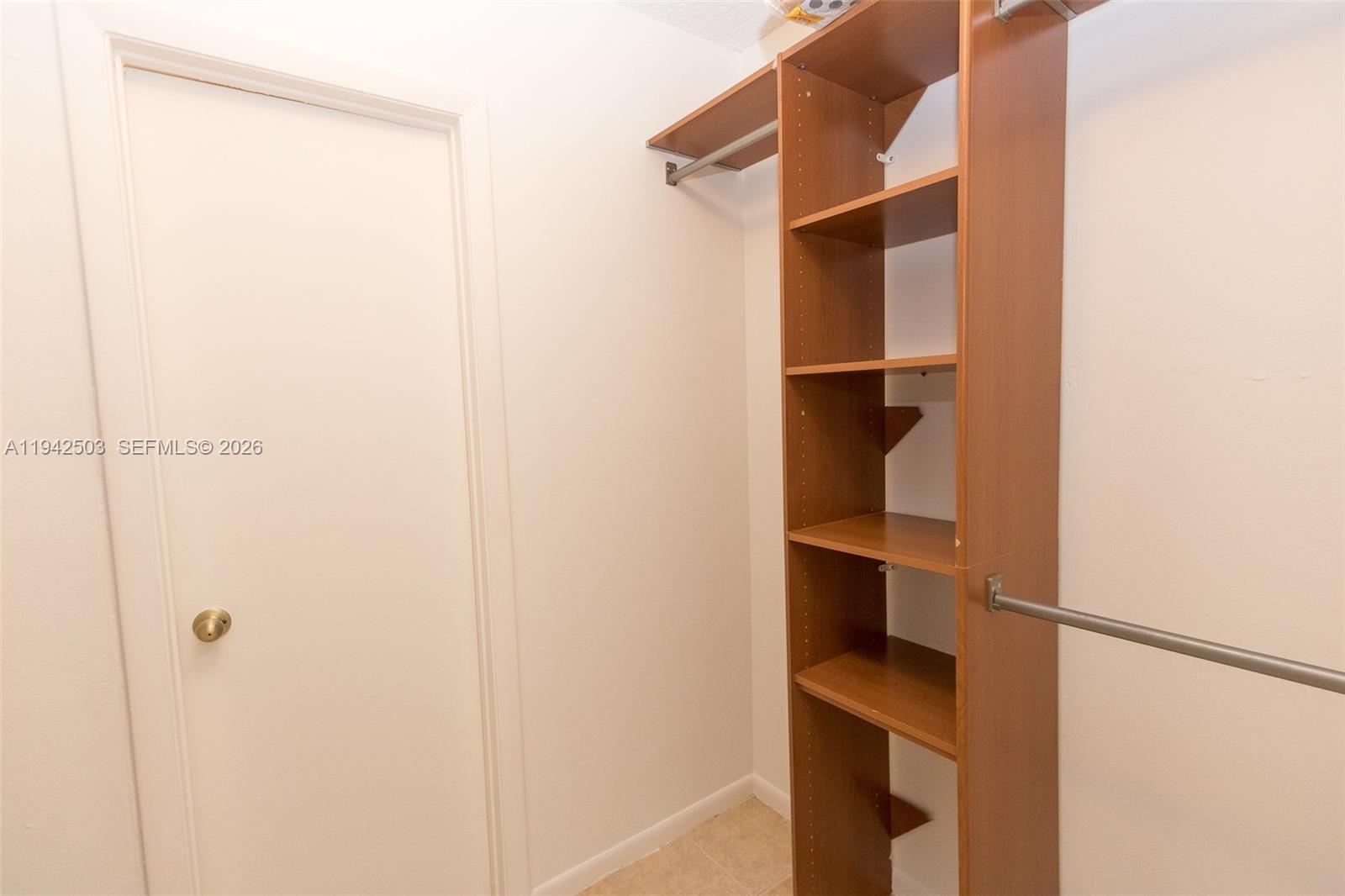 18328 Northwest 68th Avenue, Unit P Hialeah, FL 33015 - Photo 15 of 26 a view of closet