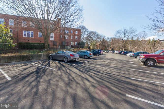 1924 North Rhodes Street, Unit 88 Arlington, VA 22201 - Photo 15 of 20 a cars parked on the side of a street