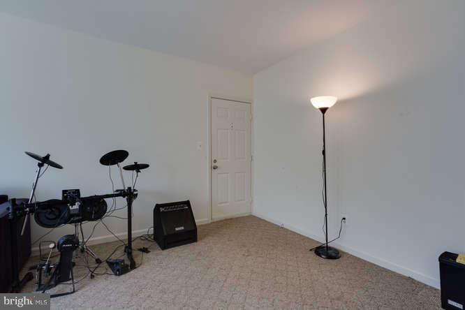 1924 North Rhodes Street, Unit 88 Arlington, VA 22201 - Photo 4 of 20 a view of a room with gym equipment