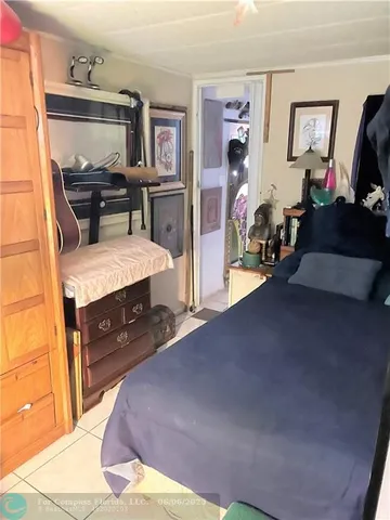 a bed room with a bed and furniture