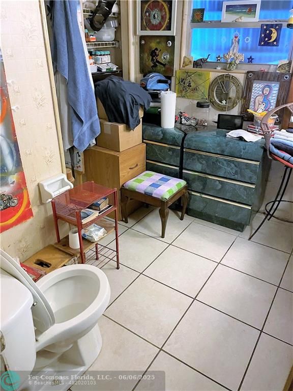 1830 Southwest 83rd Terrace Davie, FL 33324 - Photo 9 of 15 a living room with furniture and a fireplace