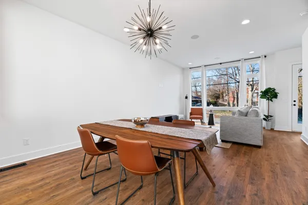 a view of a livingroom with furniture and a table