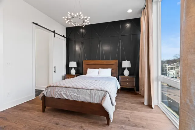 a bathroom with double sink and a mirror