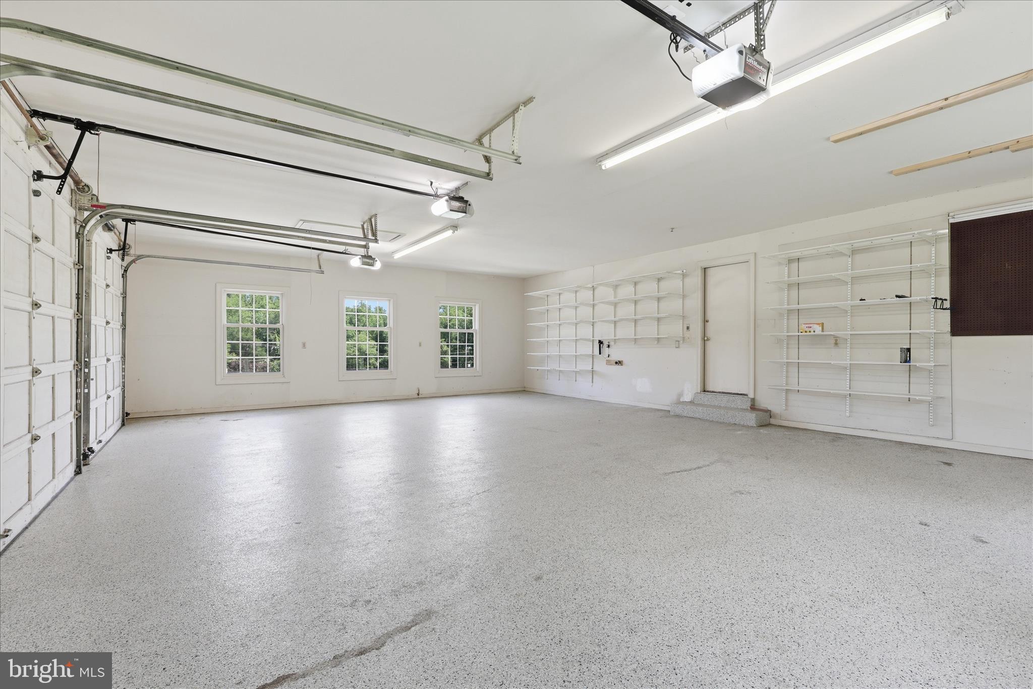 1051 Kelso Road Great Falls, VA 22066 - Photo 31 of 40 Three-car side-load garage with generous space