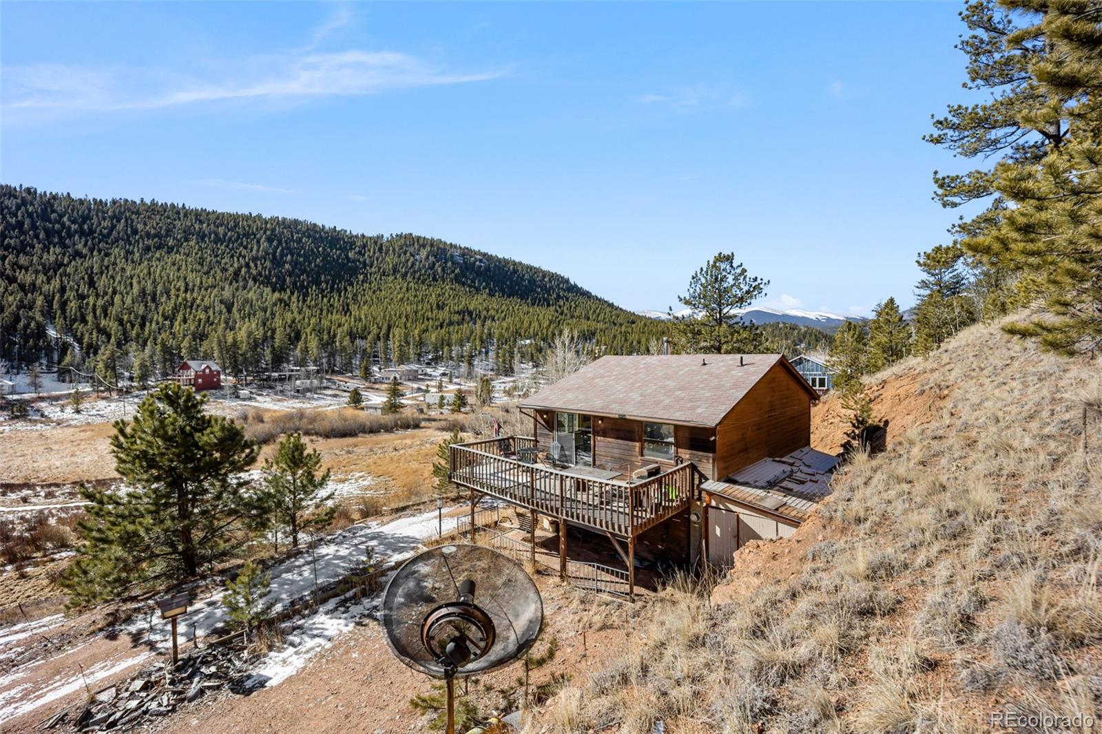 415 Bishop Road Bailey, CO 80421 - Photo 29 of 39 a view of swimming pool outdoor seating and mountain view