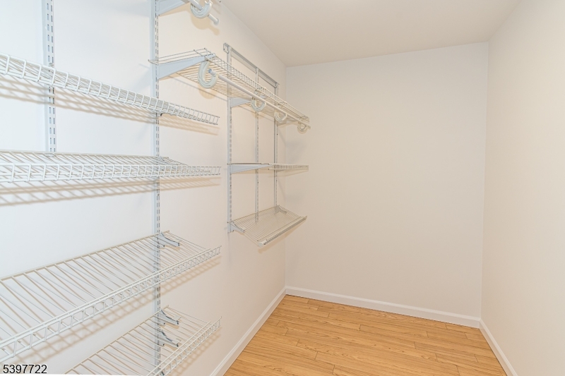530 Park Avenue, Unit 214 Scotch Plains, NJ 07076 - Photo 17 of 17 a view of a room with racks on the wall